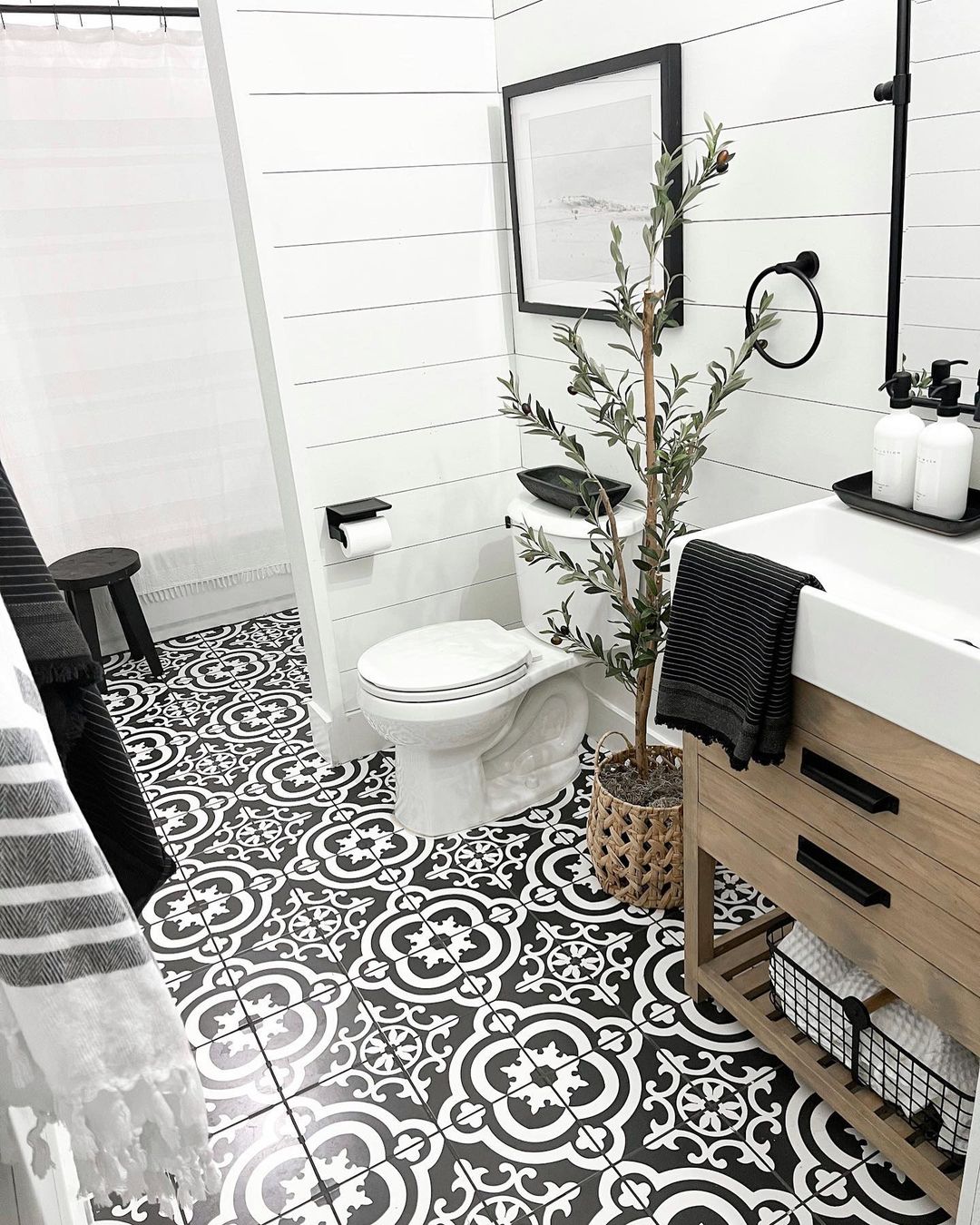 a bathroom with a sink and toilet