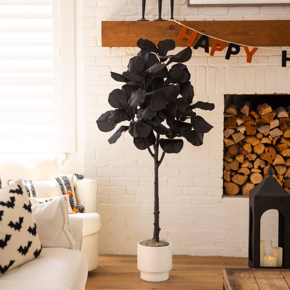a tree in a room with a fireplace