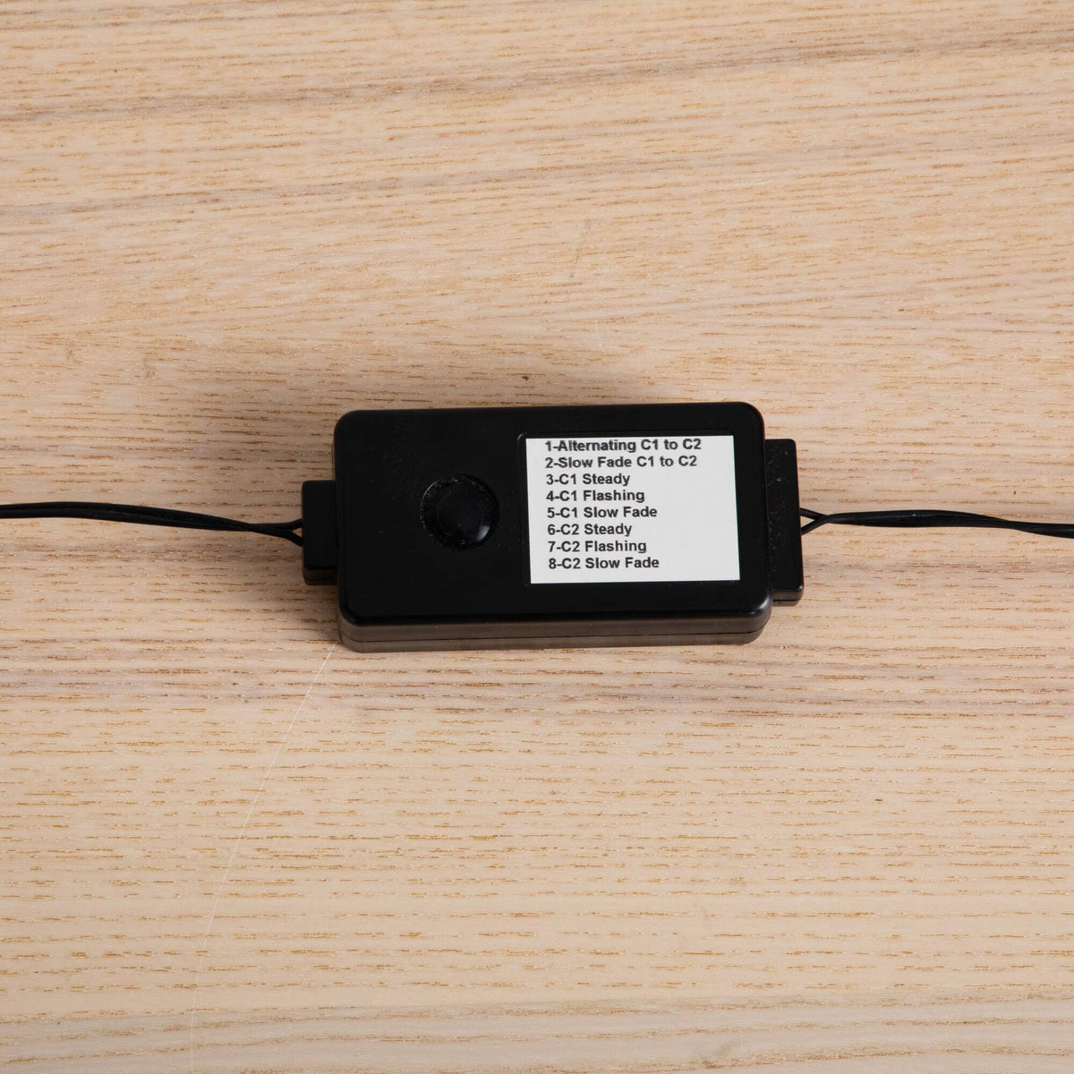 a black rectangular object with a white label on it