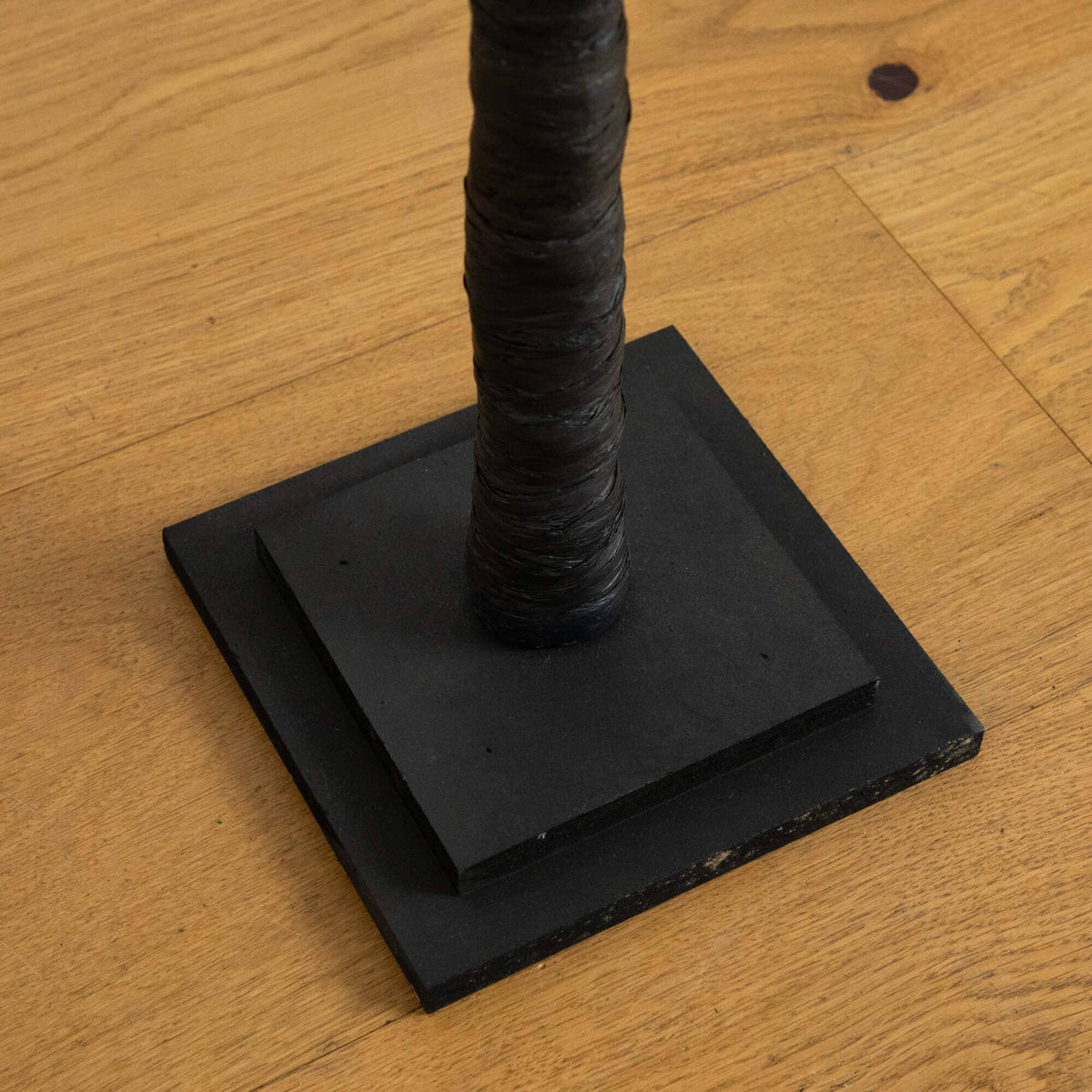 a black object on a wood surface