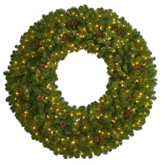 a wreath with lights and pinecones