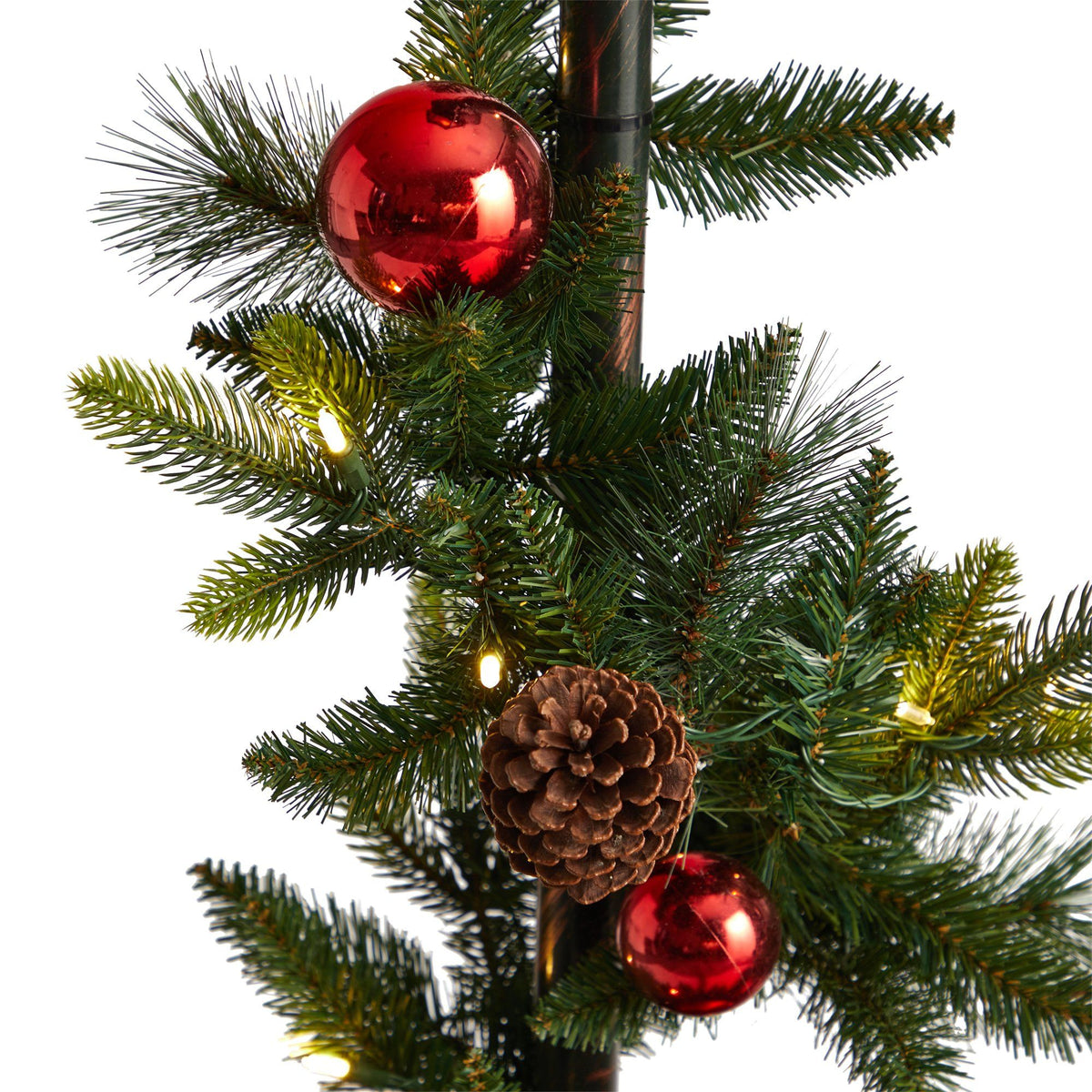 a pinecone and ornaments on a tree