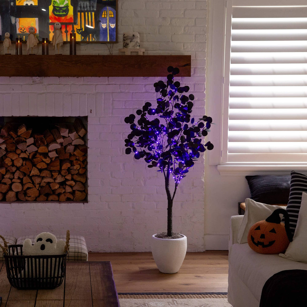 a tree in a room with a fireplace