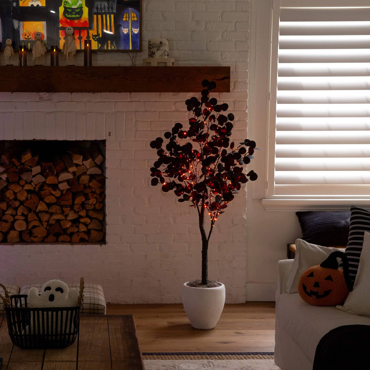 a tree in a room with a fireplace