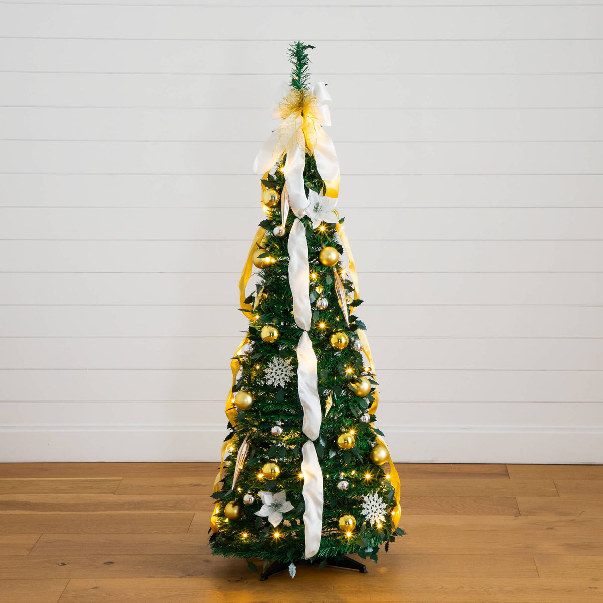 a christmas tree with lights and ornaments