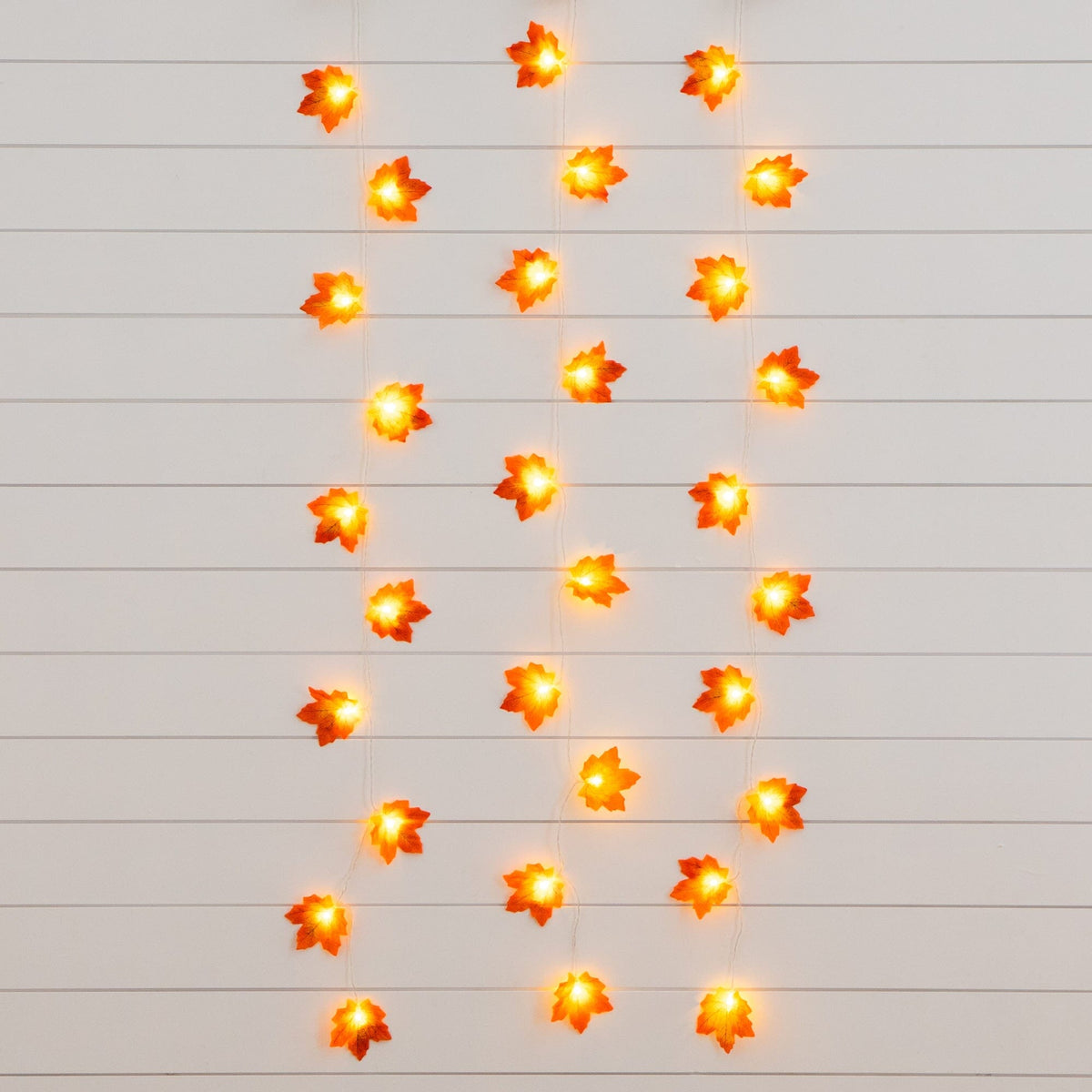 a string of lights on a wall