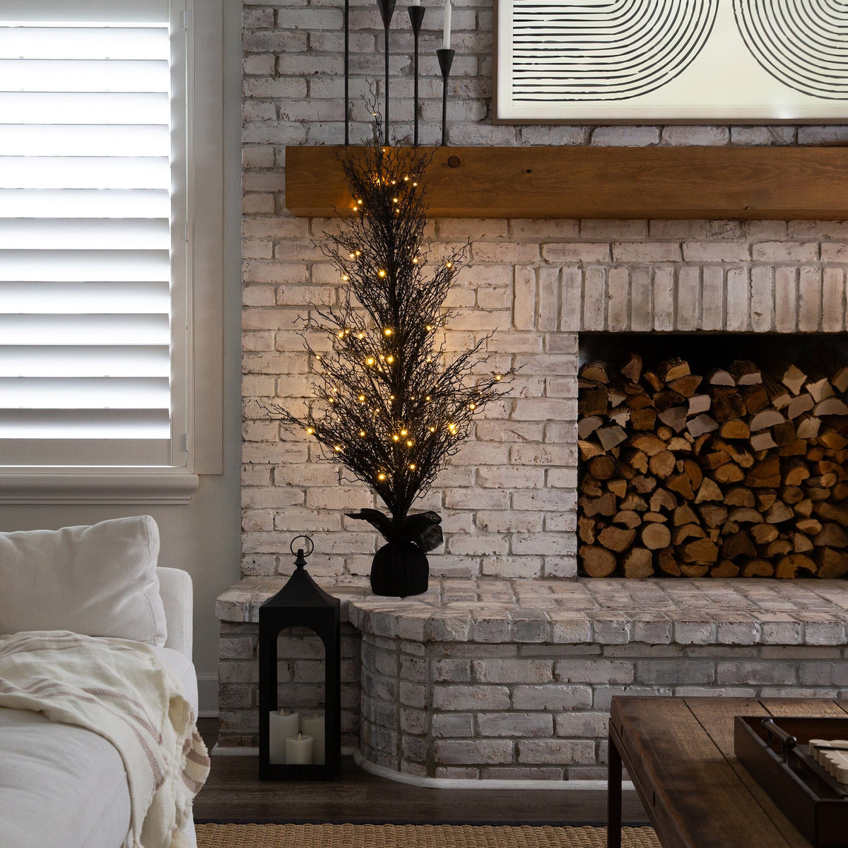 a fireplace with a tree in it