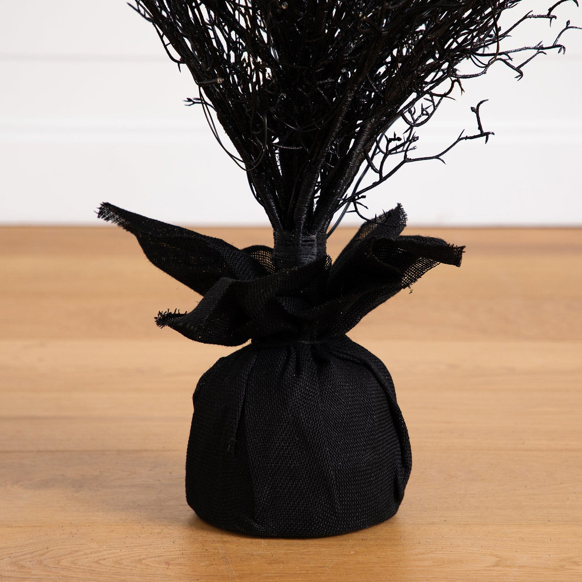 a black bag with a black object on it