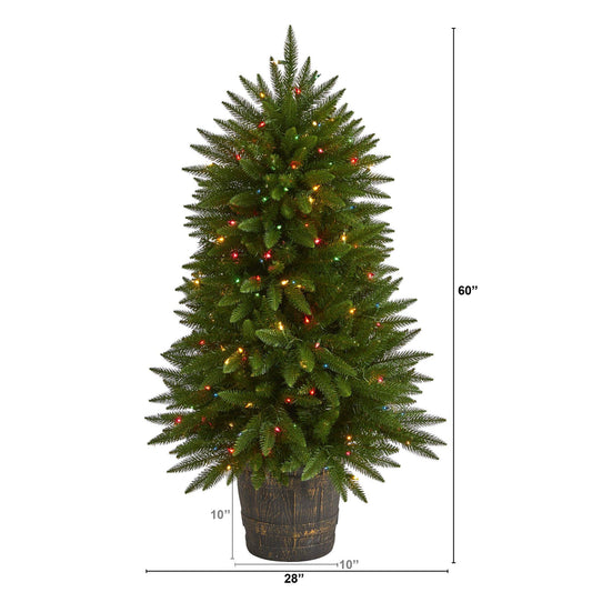 a tall christmas tree with lights