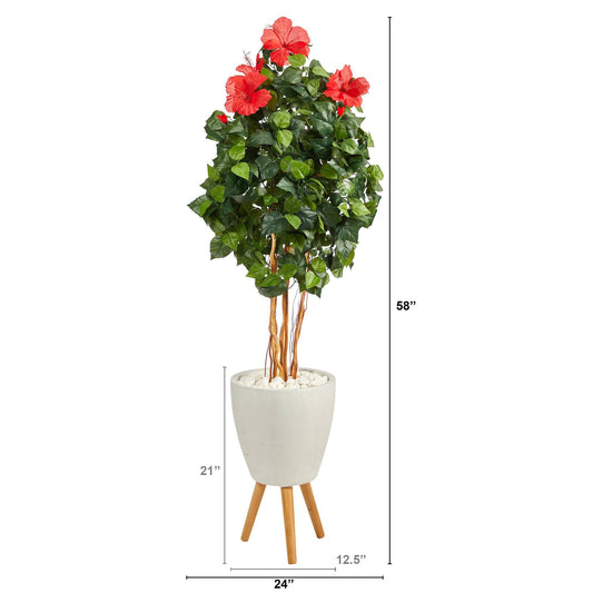 a tall plant with red flowers