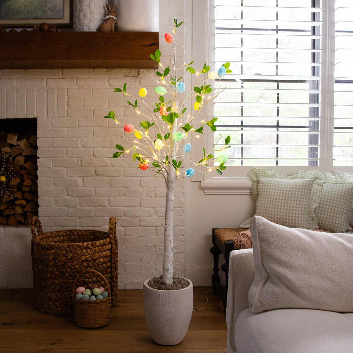 a tree with lights in a room