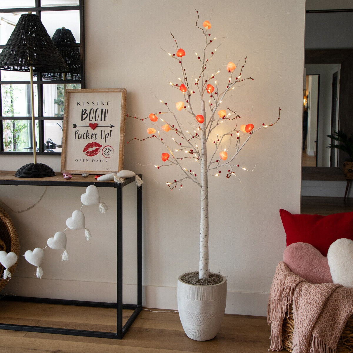 a tree with lights in a room