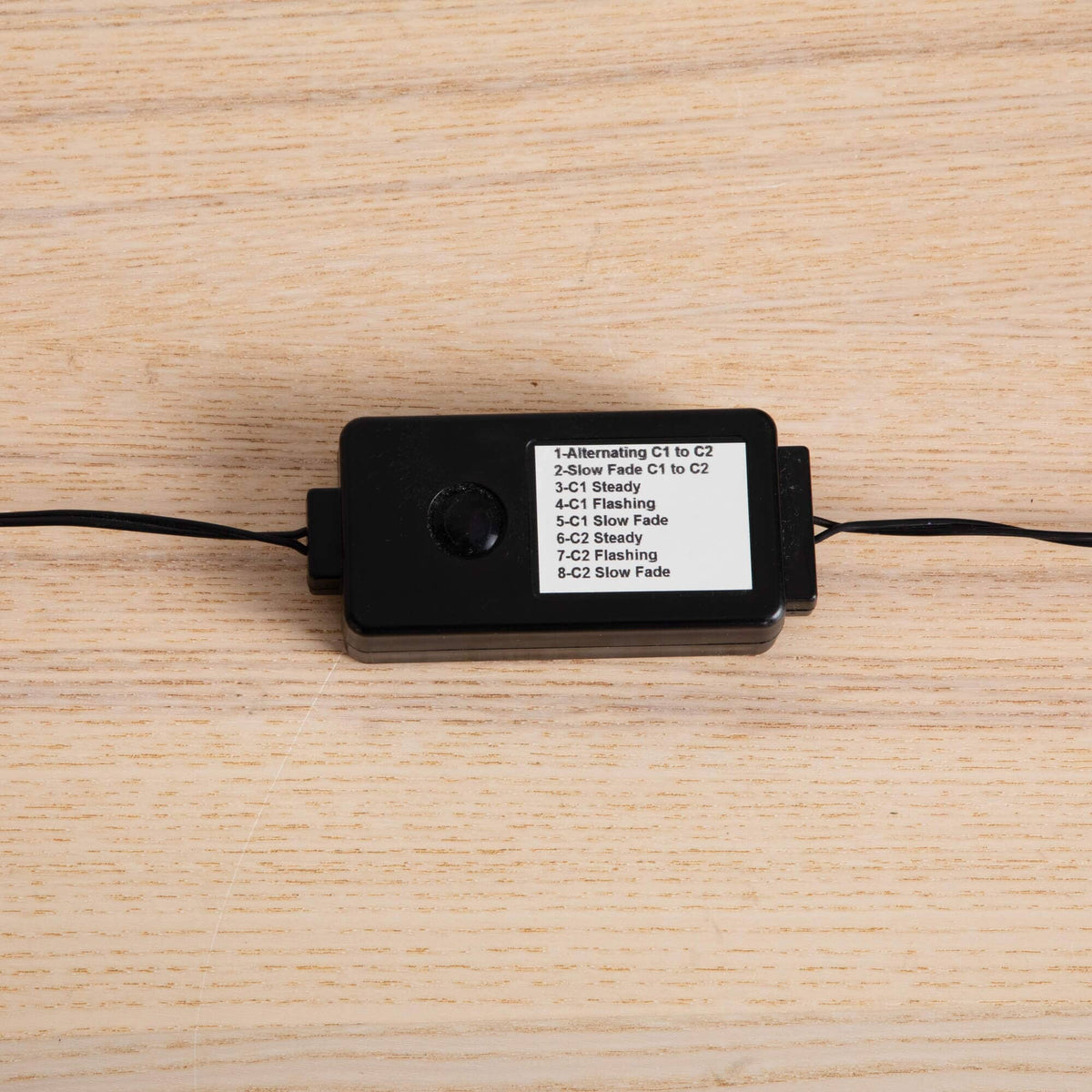 a black rectangular object with a white label on it