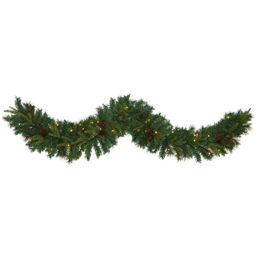 a garland of lights and pine branches