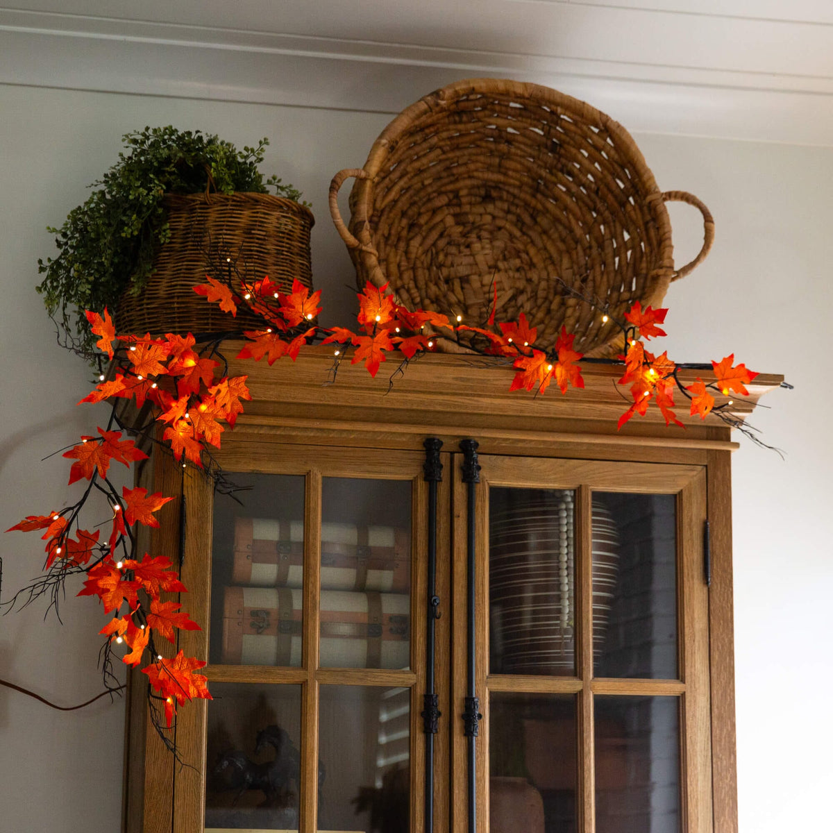 a basket on top of a cabinet