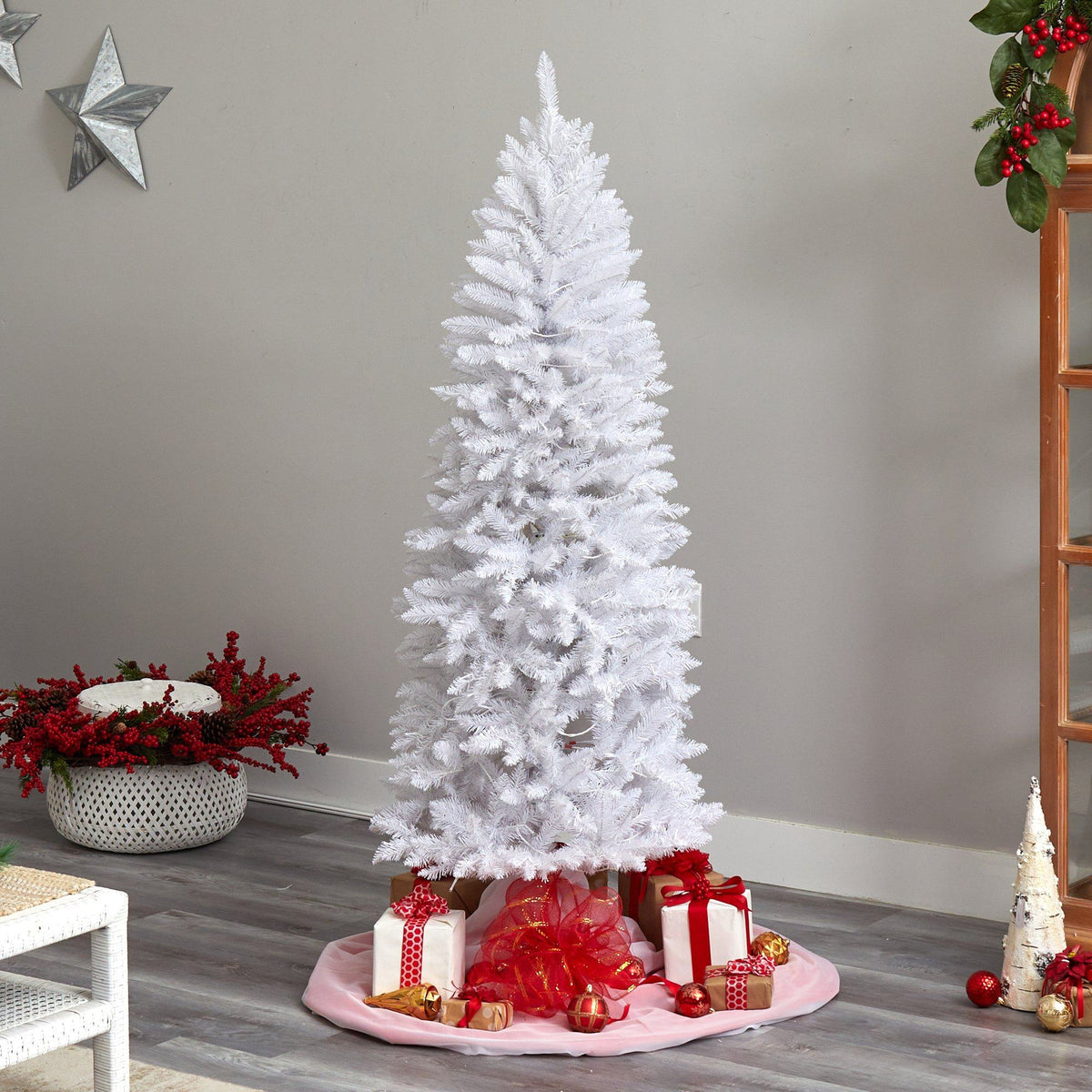 a white christmas tree with presents