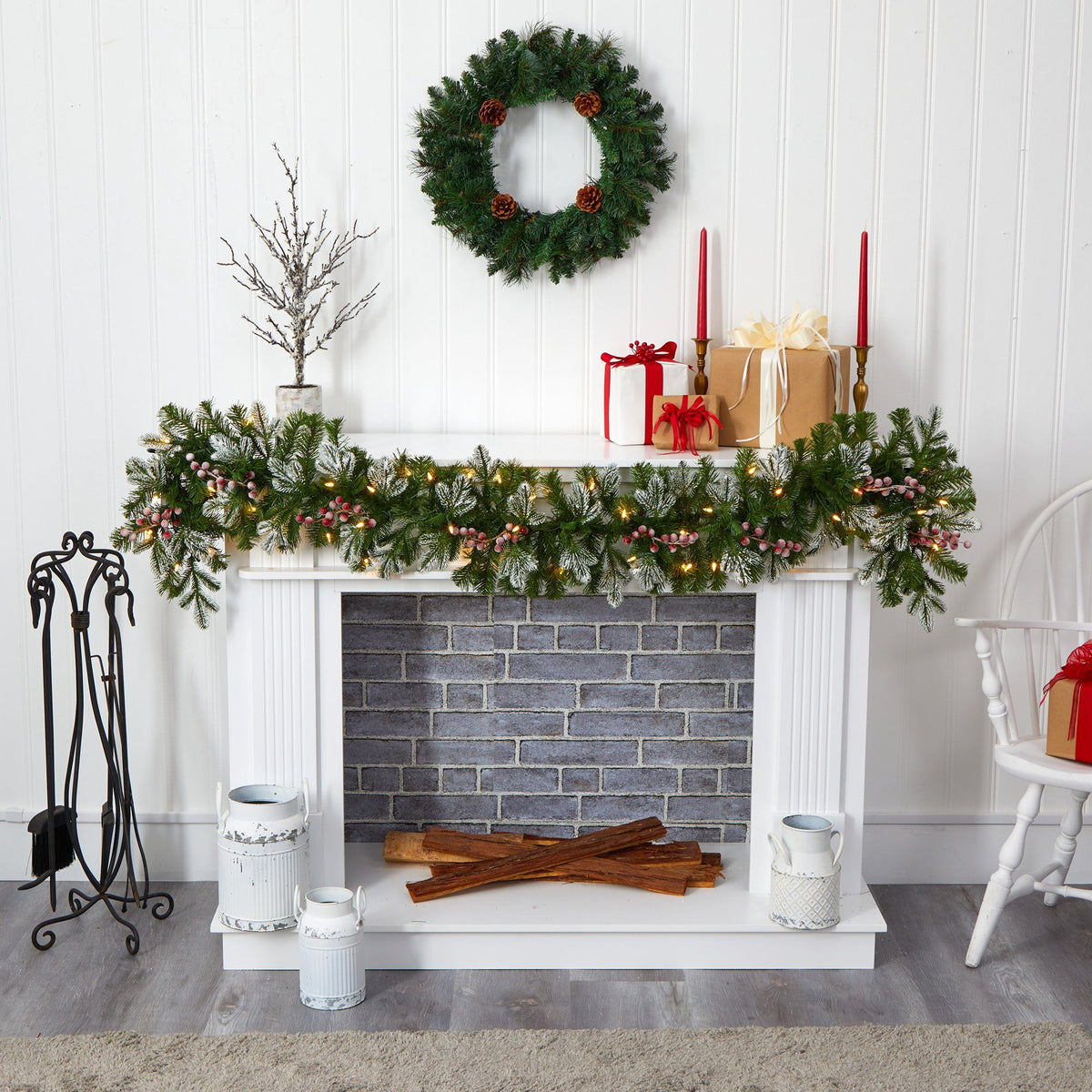 a fireplace with a wreath and a wreath on the top