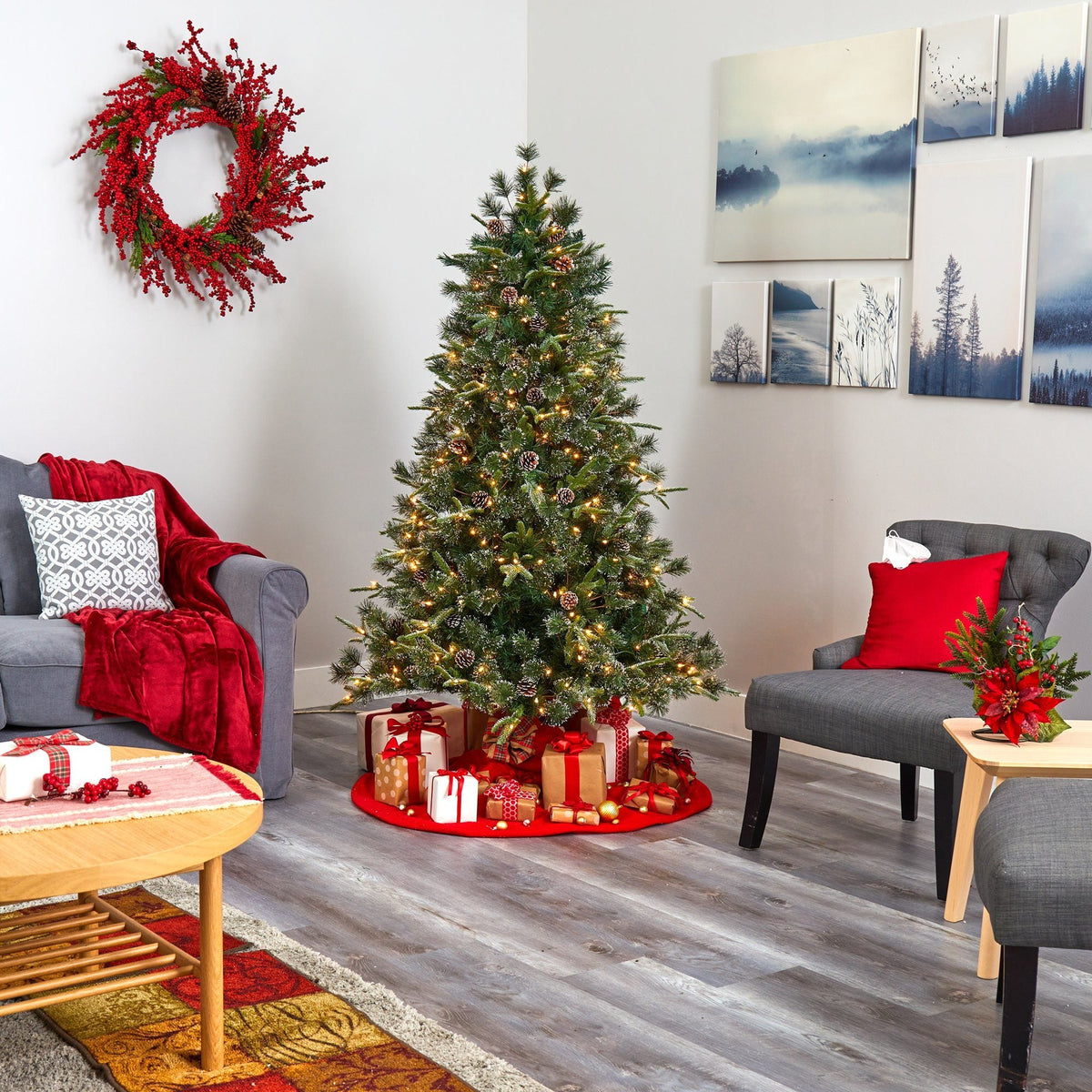 a christmas tree with presents in a room