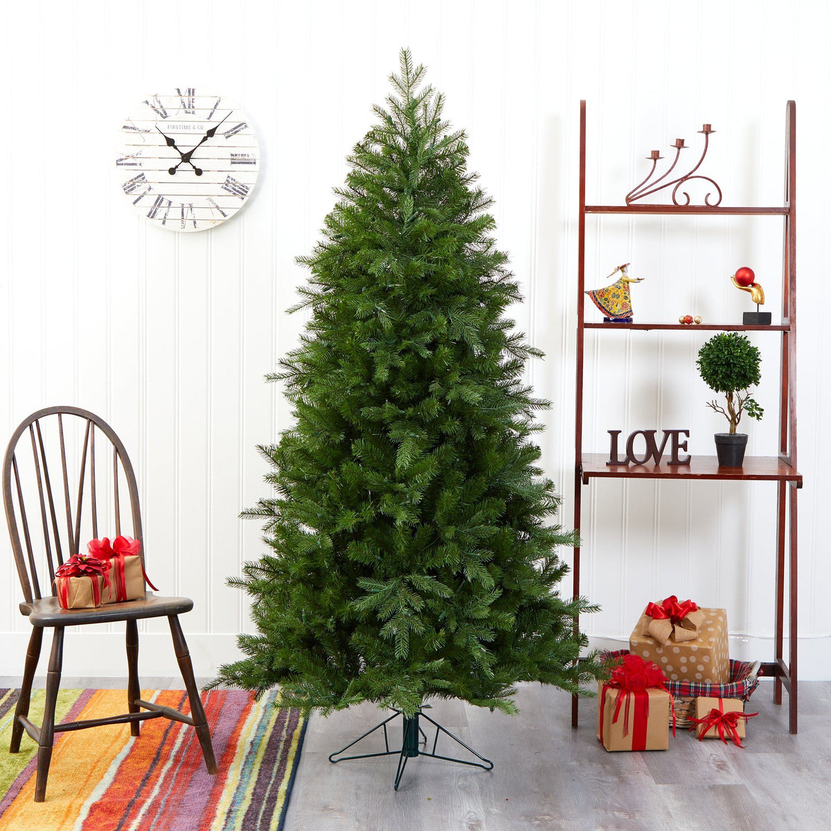 a christmas tree with presents and a shelf
