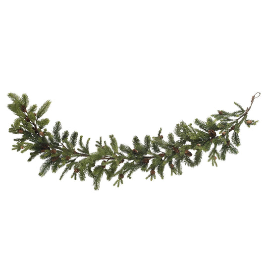 a green branch with pine needles