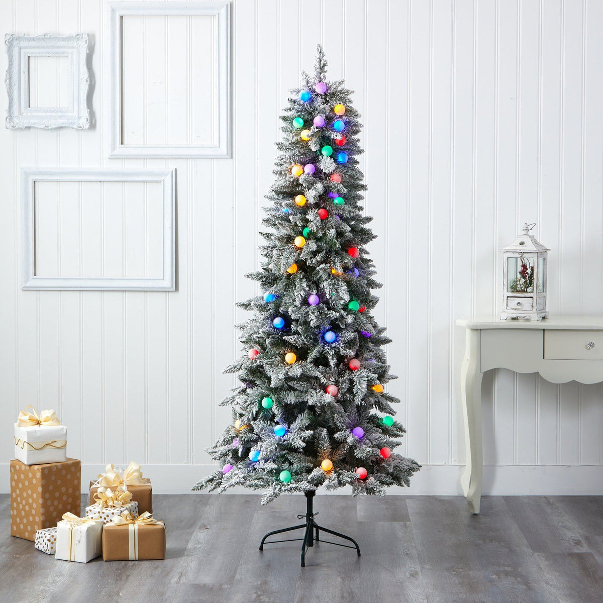 a christmas tree with lights and presents