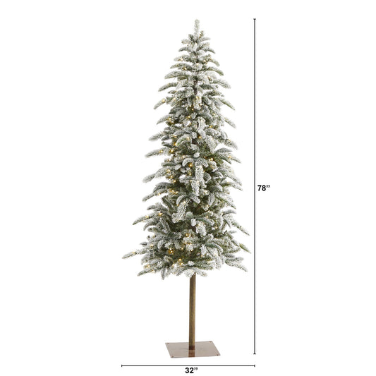 a tall artificial christmas tree with lights