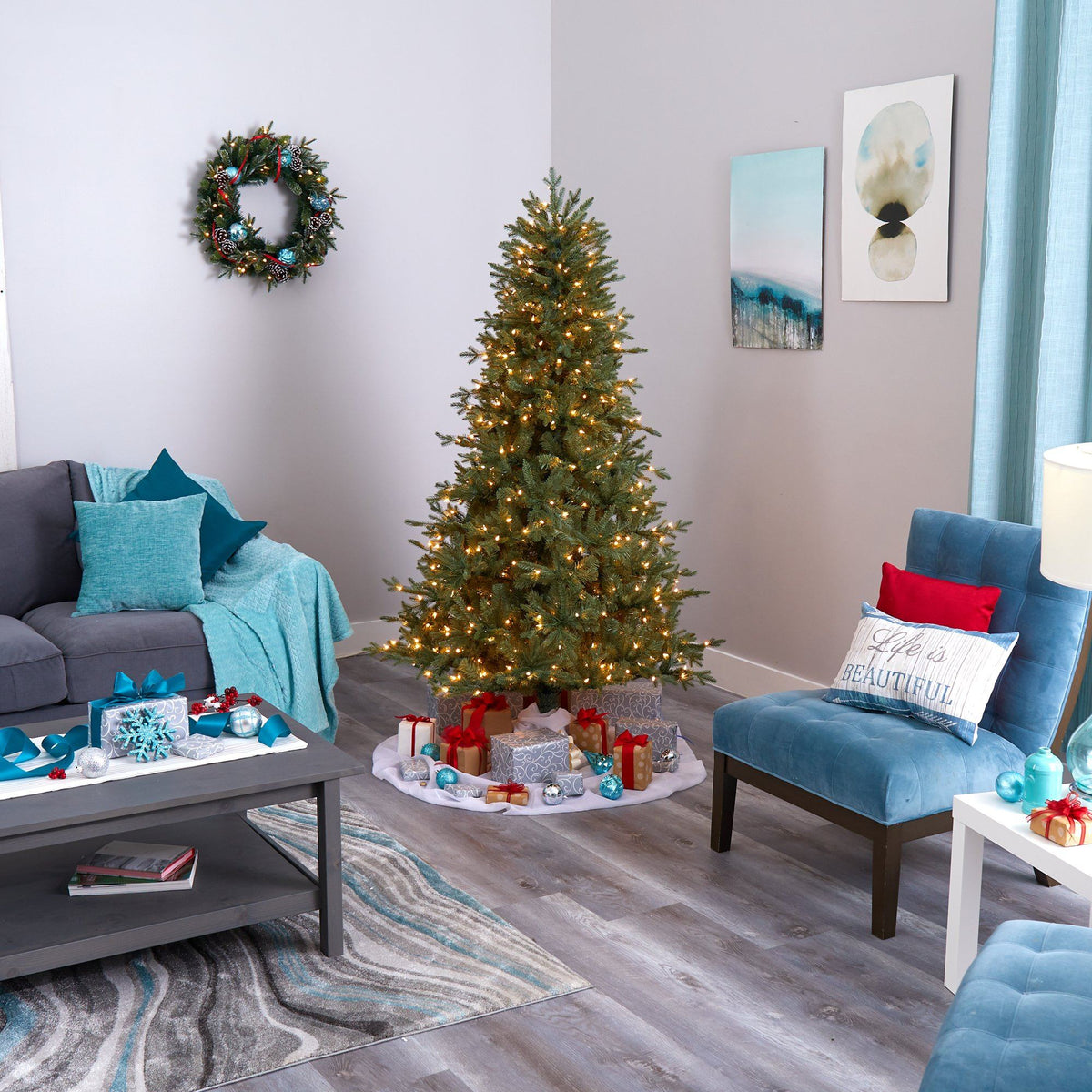 a living room with a christmas tree and a couch
