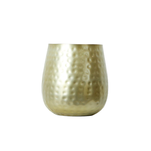 a gold vase with a textured surface
