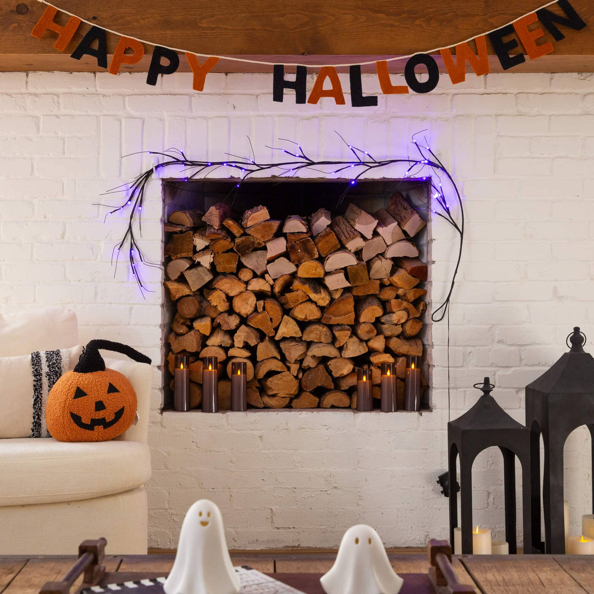 a fireplace with a stack of wood in it
