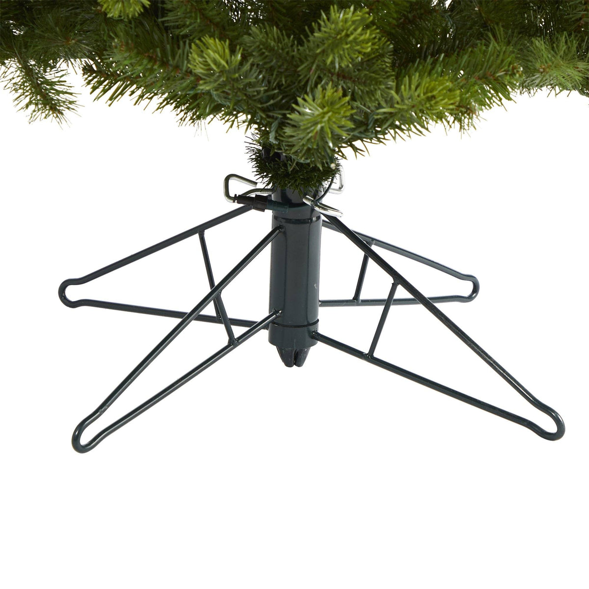 a christmas tree with a metal base