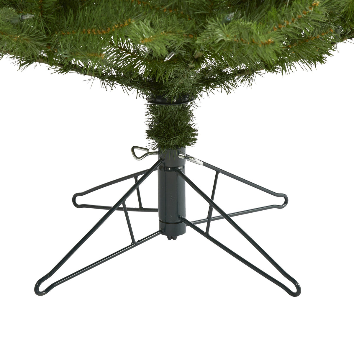 a christmas tree with a metal base