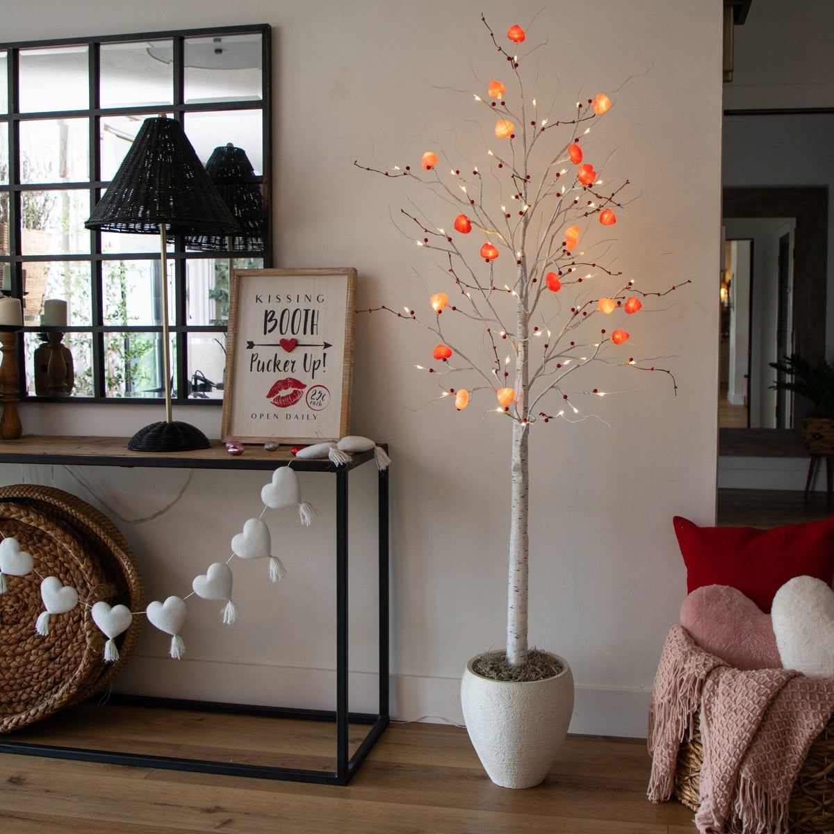 a tree with lights in a room
