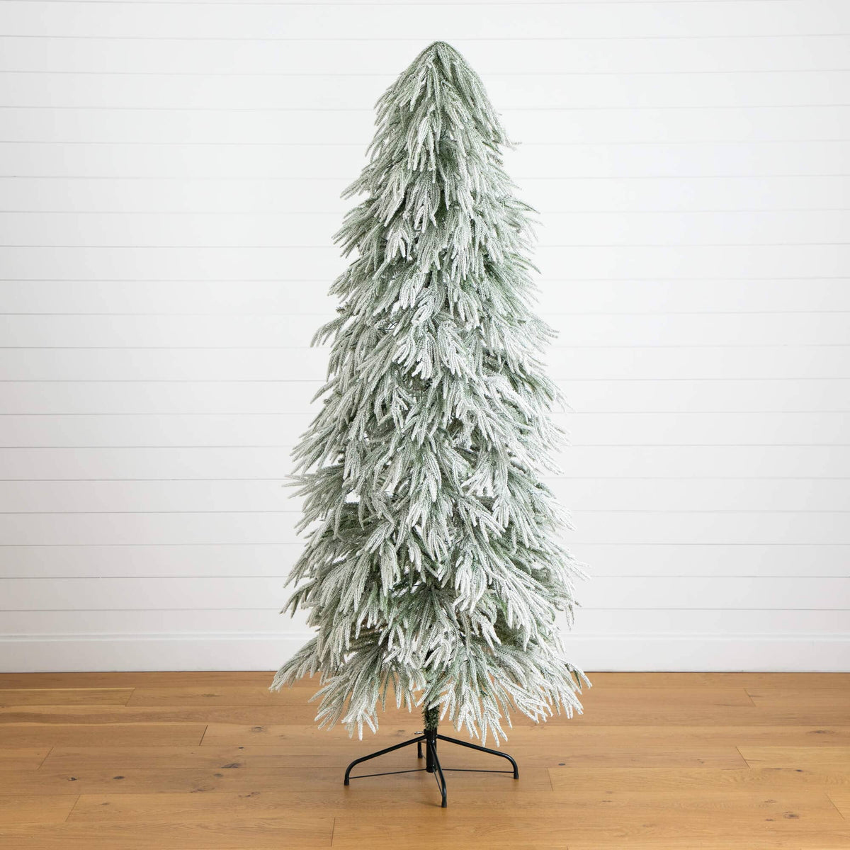 a christmas tree on a stand