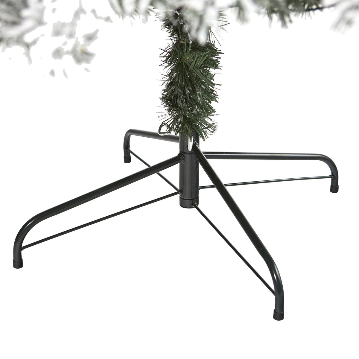 a christmas tree with a green garland on it