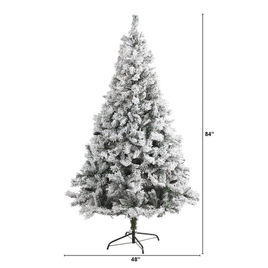 a tall artificial christmas tree with a height of 6 inches
