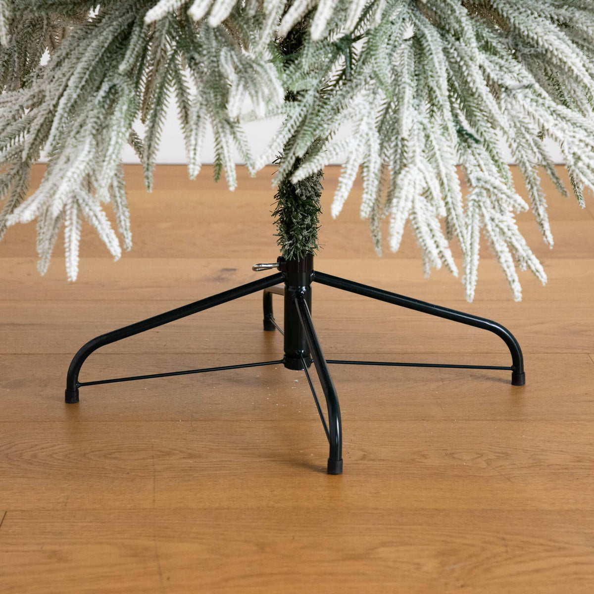a tree with a metal base