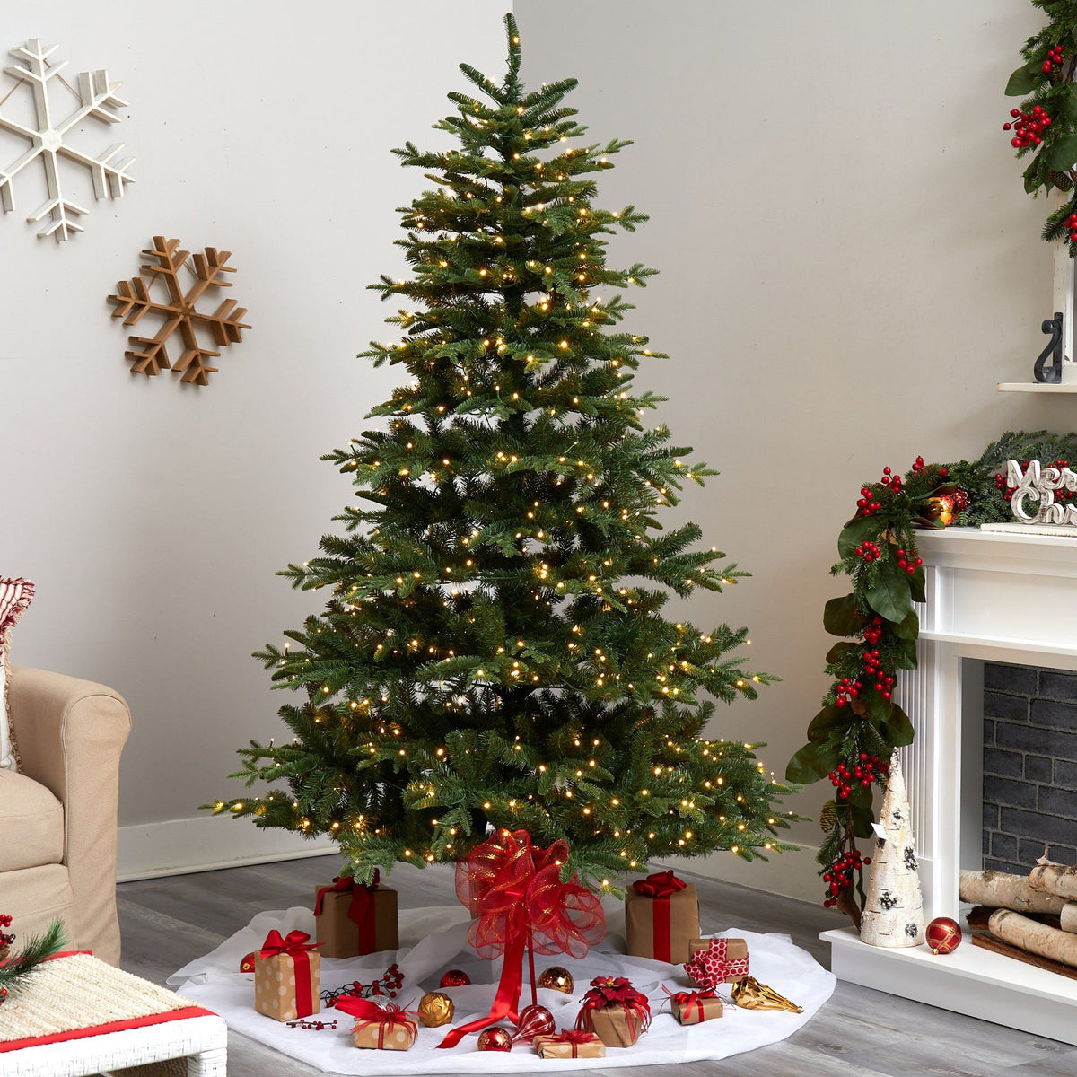 a christmas tree with lights and presents