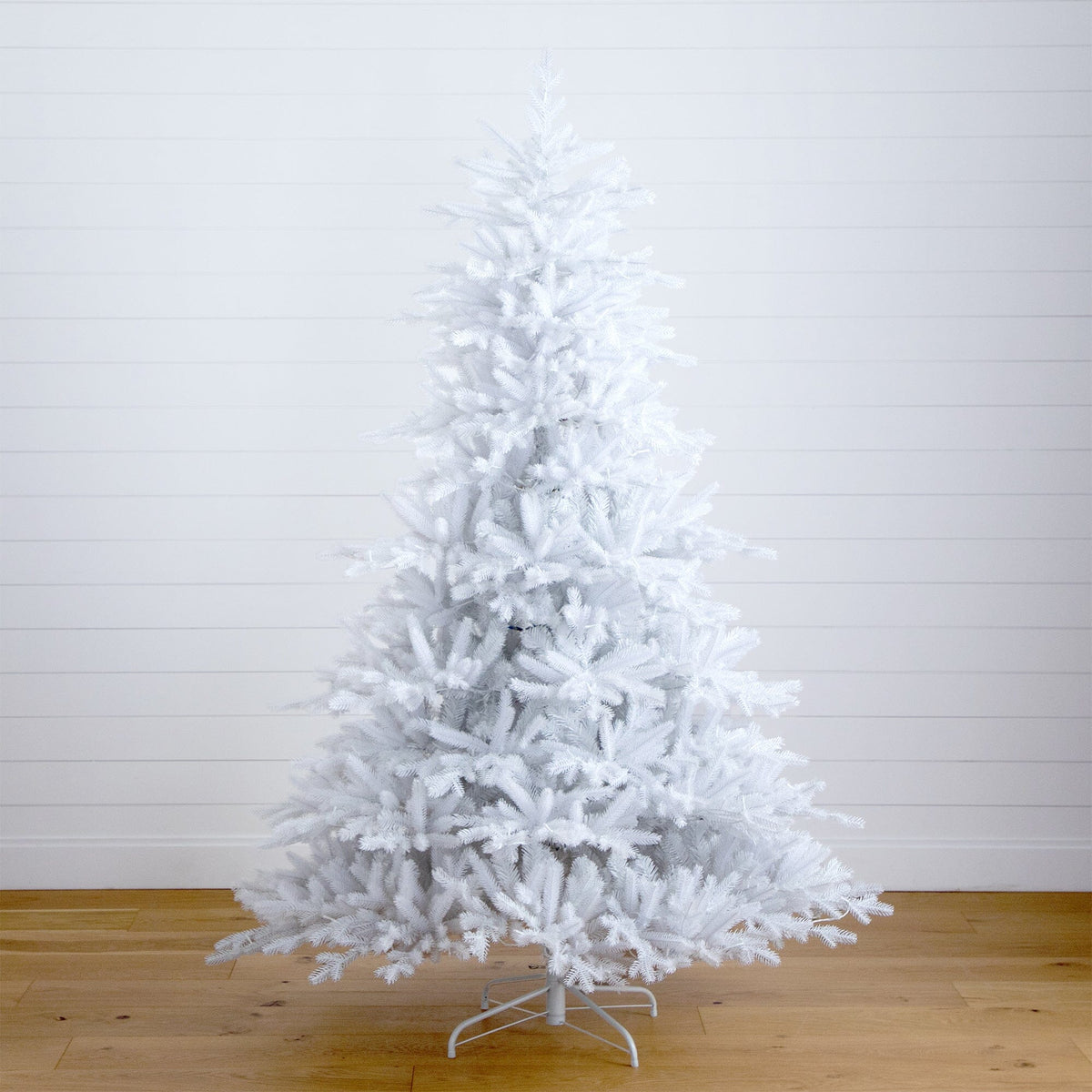 a white christmas tree in a room
