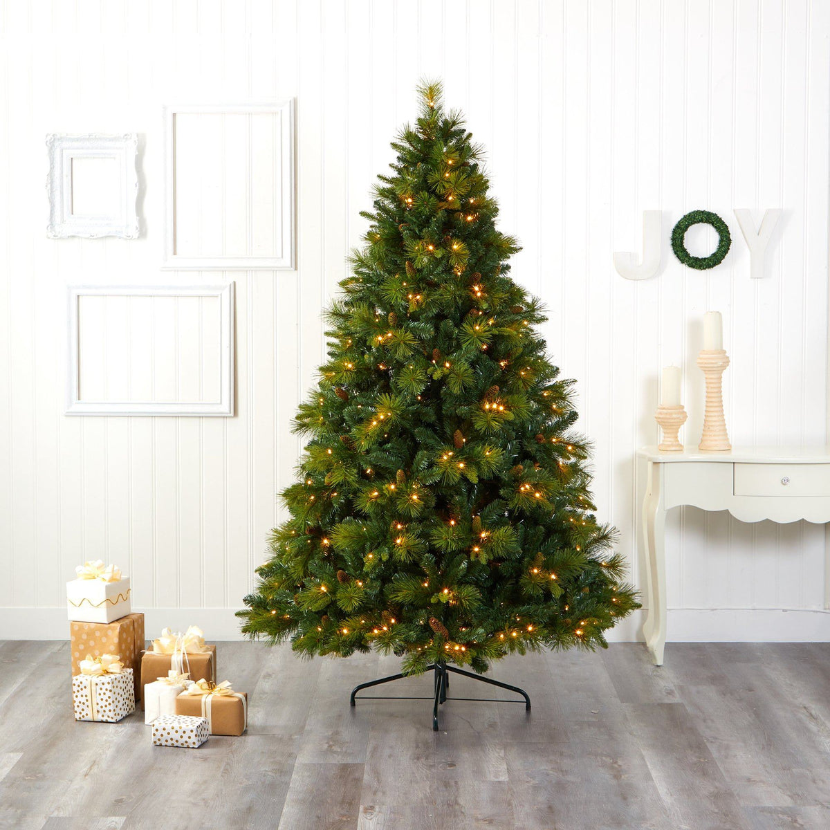 a christmas tree with lights and presents