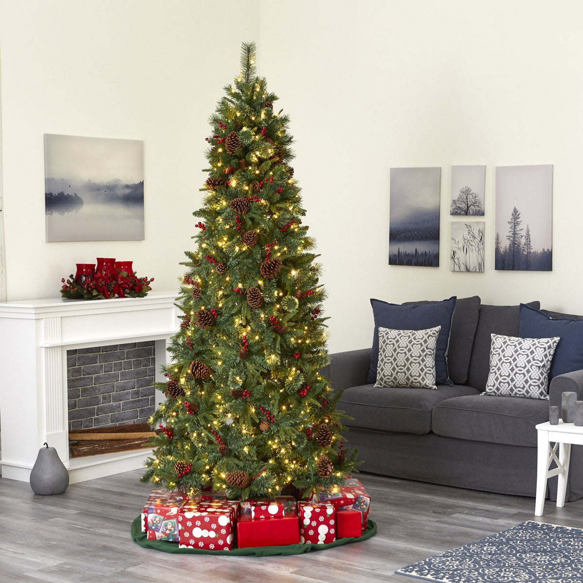 a christmas tree with presents in a room