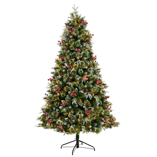a christmas tree with lights and berries