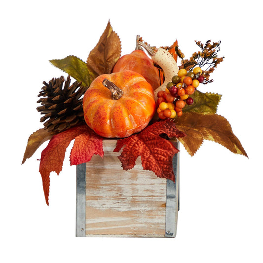 a wooden box with fall leaves and pumpkins