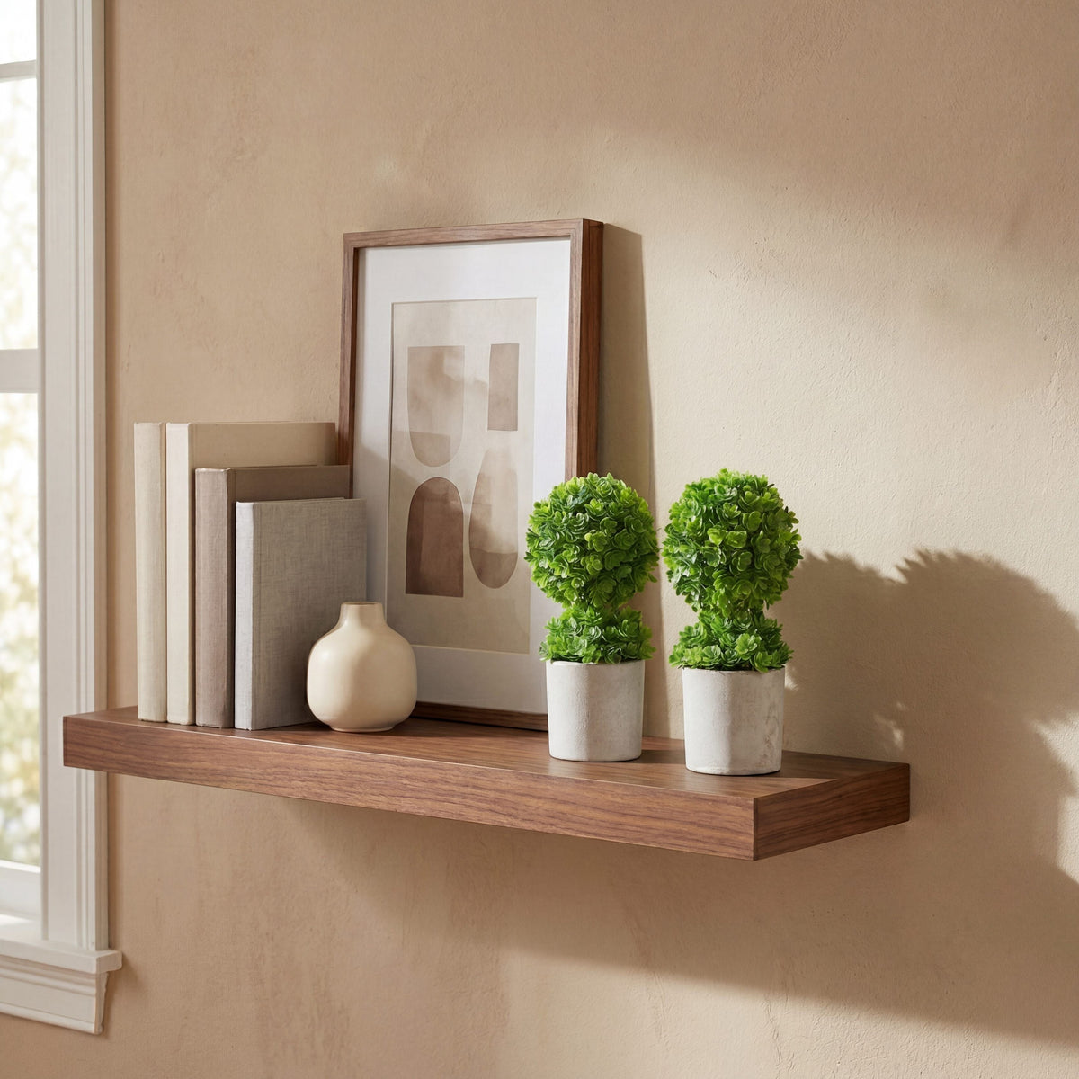 a shelf with plants and a picture on it