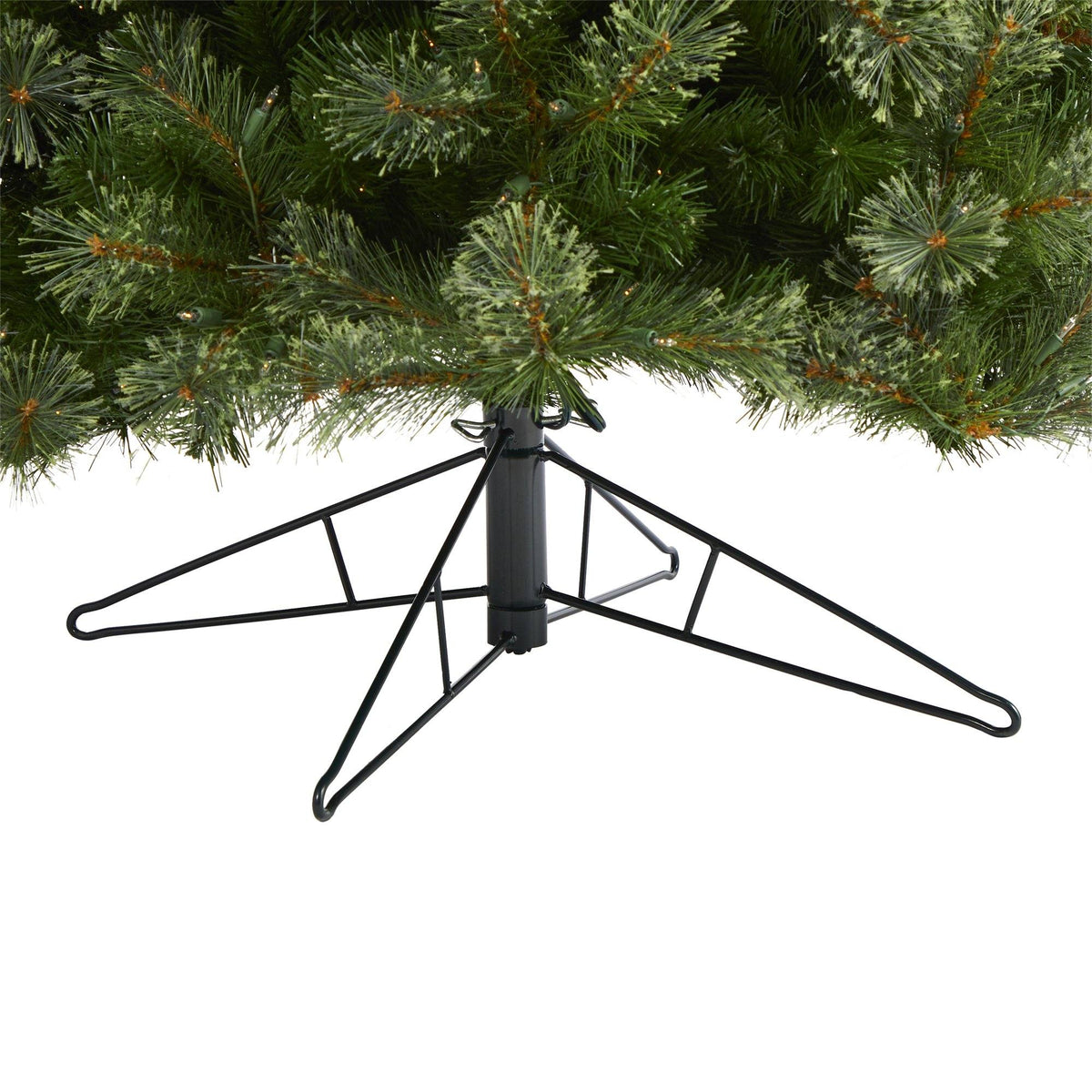 a christmas tree with a metal stand