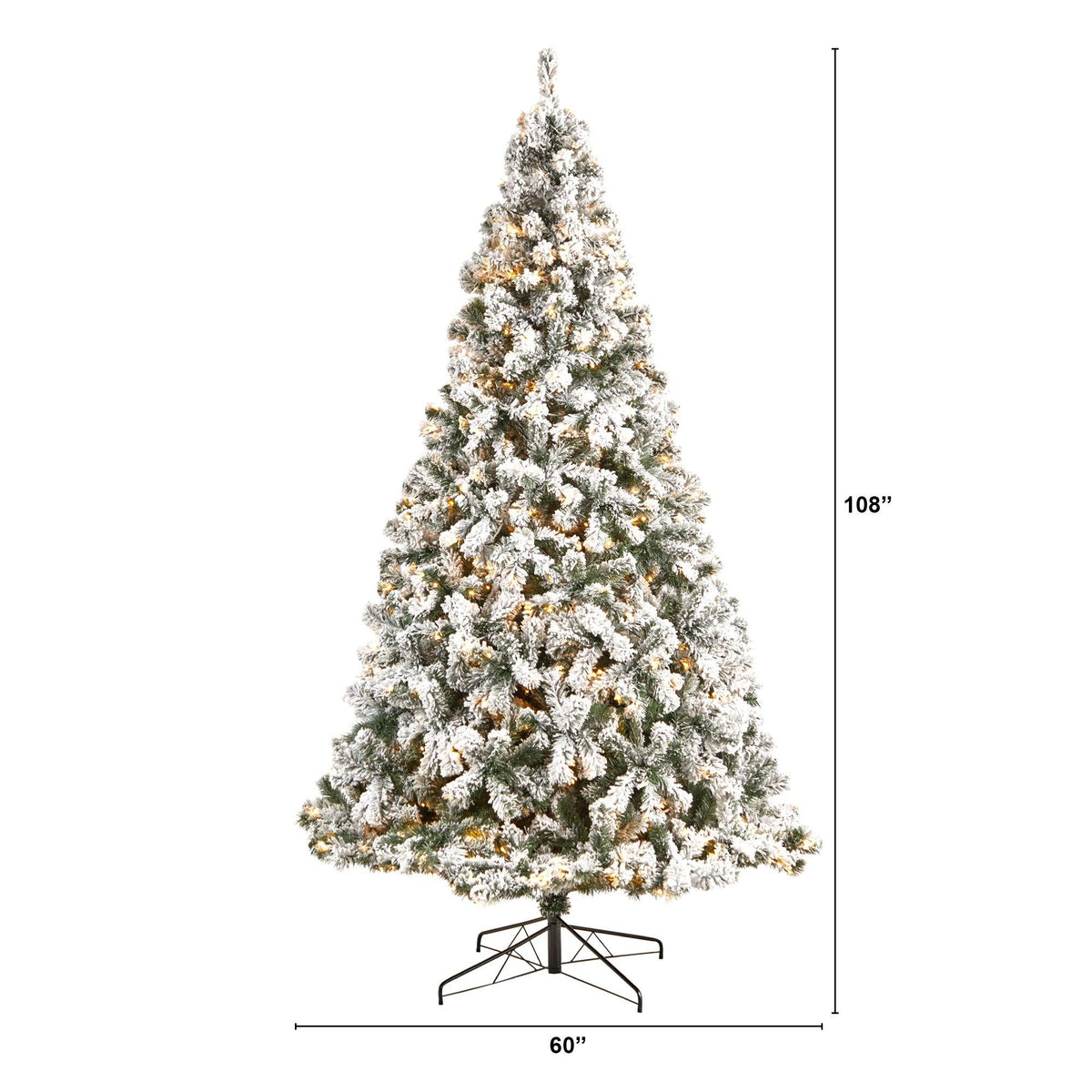 a tall christmas tree with lights and snow