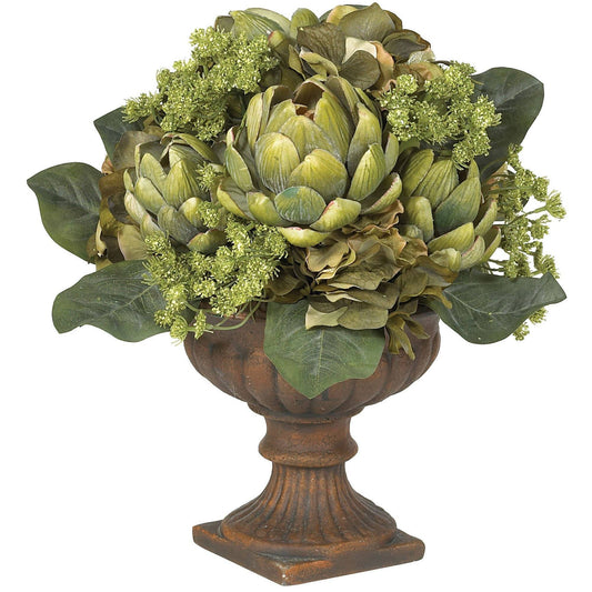 a vase with green flowers