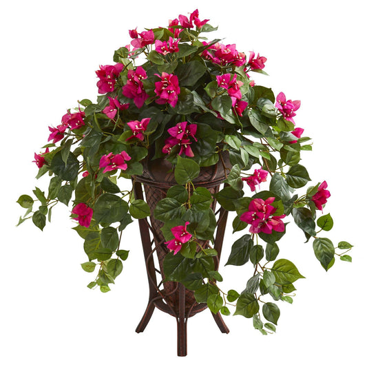a potted plant with pink flowers