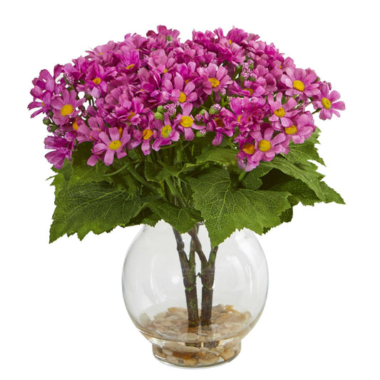a vase with pink flowers