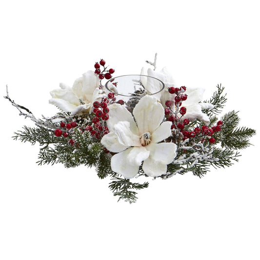 a white flowers and red berries in a glass vase