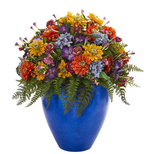 a blue vase with colorful flowers